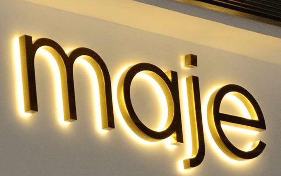 Brass 3D letters with warm backlighting
