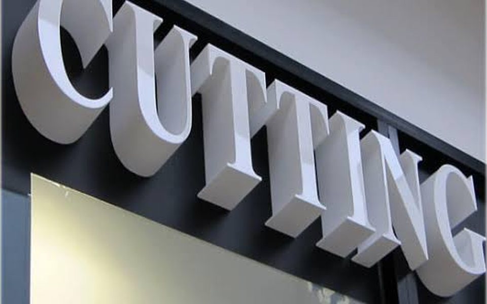 Large white 3D acrylic letters above a shopfront